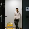 deliveryman waiting by the door